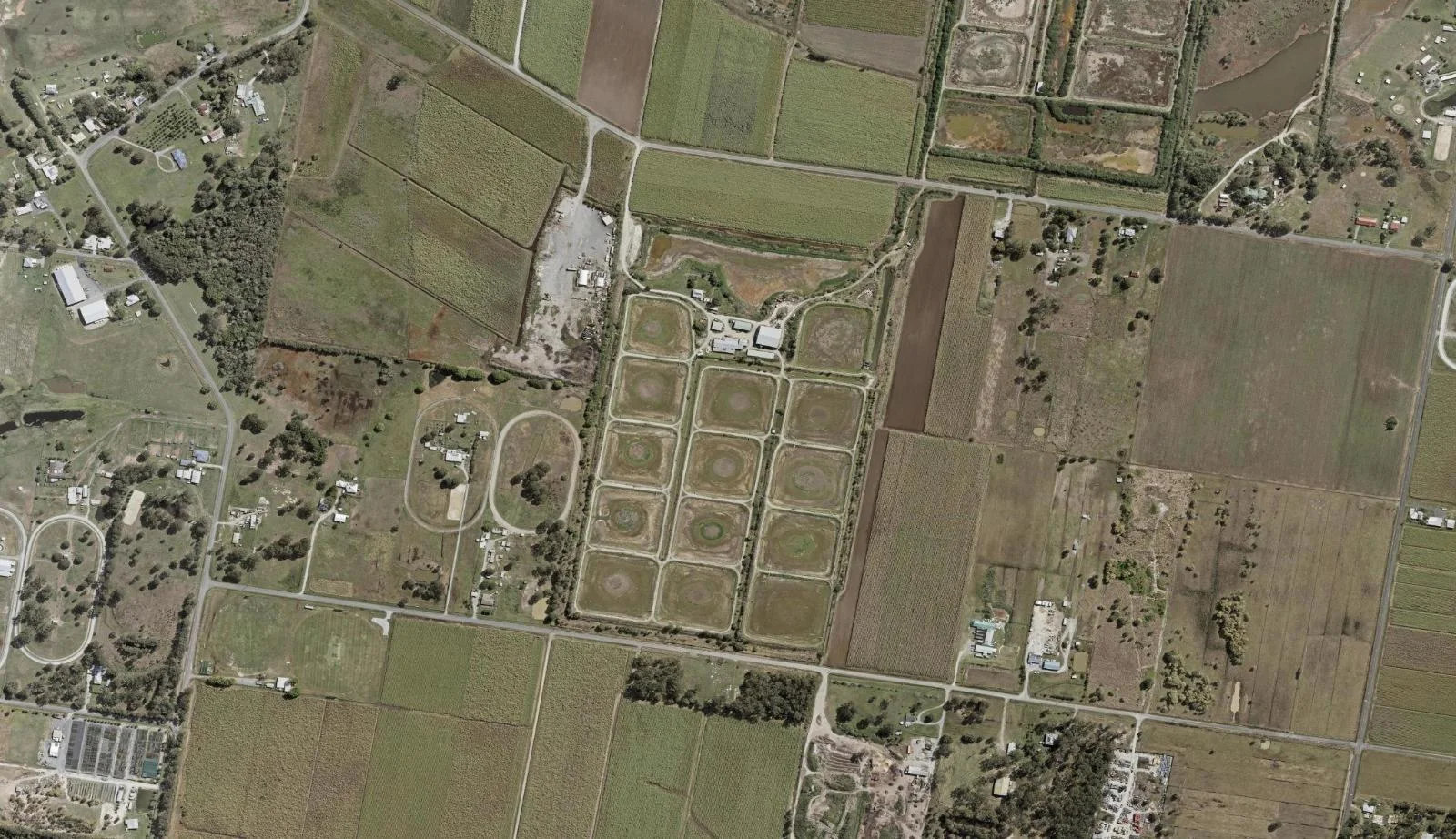 Aerial view of homes and properties in Alberton, Queensland