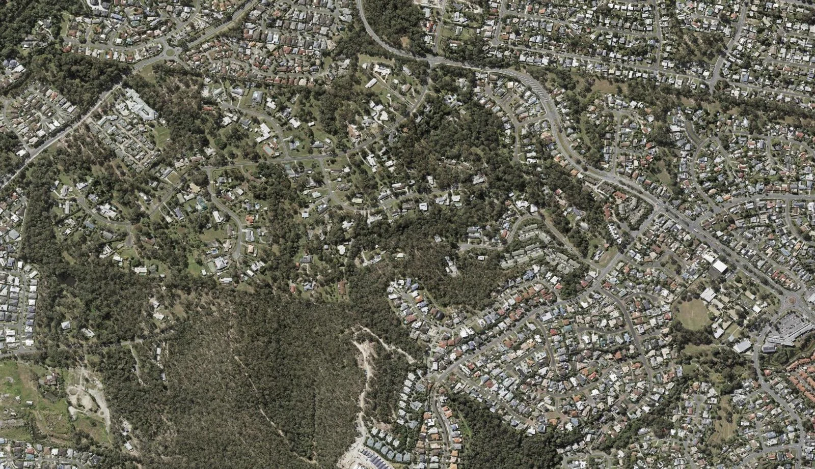 Aerial view of homes and properties in Highland Park, Queensland