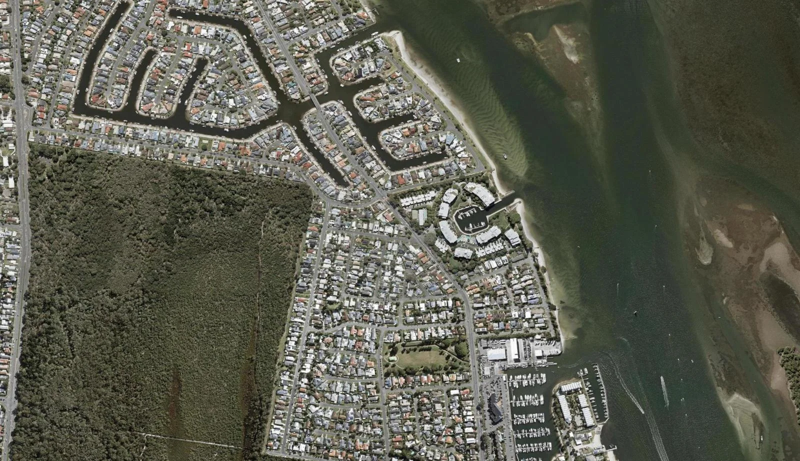 Aerial view of homes and properties in Hollywell, Queensland
