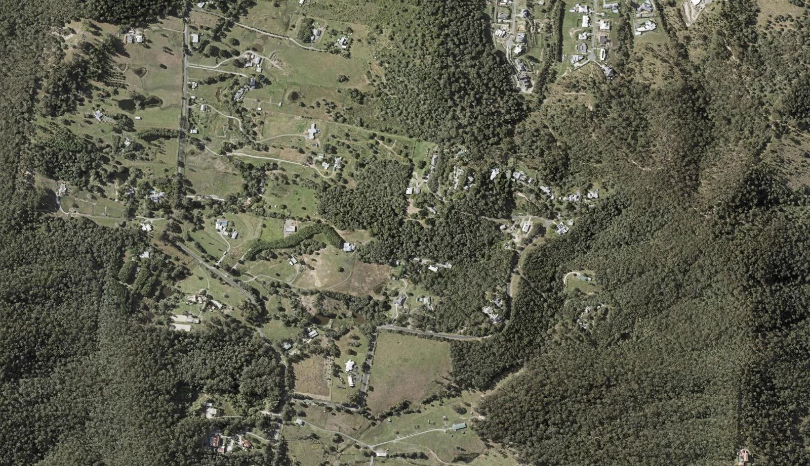 Aerial view of homes and properties in Kingsholme, Queensland