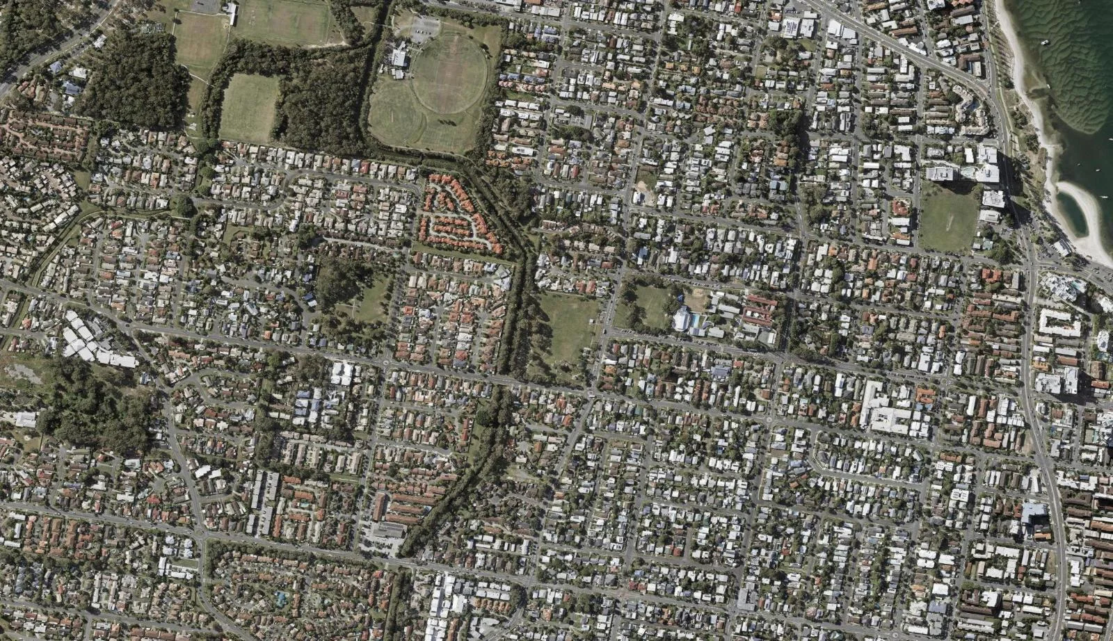 Aerial view of homes and properties in Labrador, Queensland