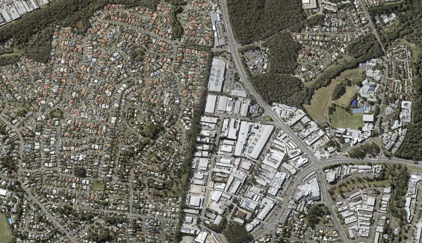 Aerial view of homes and properties in Molendinar, Queensland
