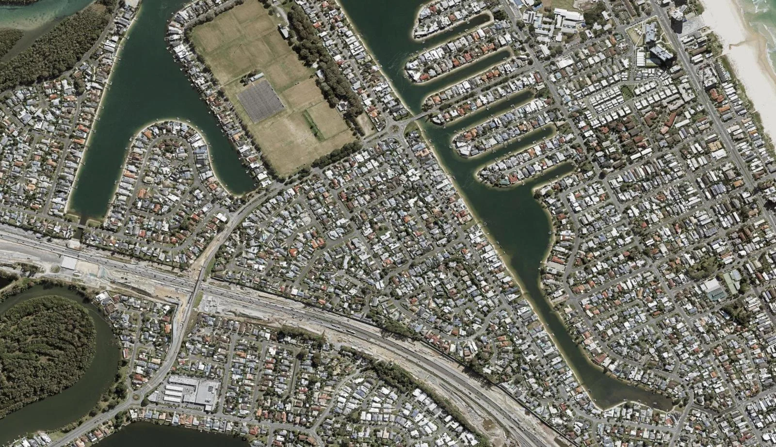 Aerial view of homes and properties in Palm Beach, Queensland